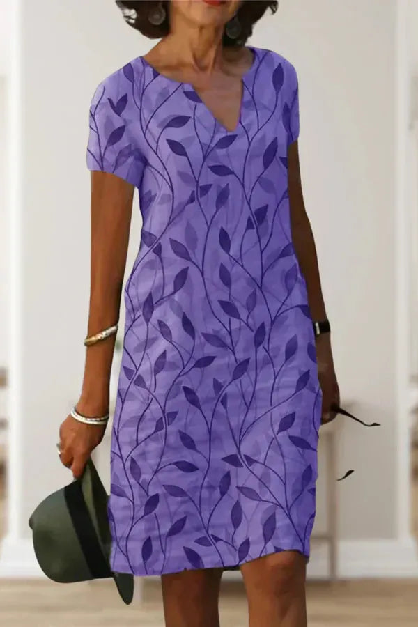 Chic women's belted midi dress, offering an elegant and sophisticated look for various events.