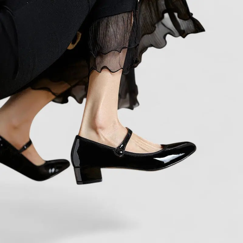 Comfortable red Mary Jane flats for women, offering orthopedic arch support & classic style for walking.