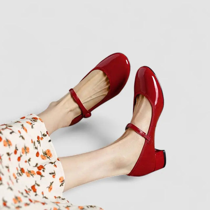 Elegant women's flat Mary Jane shoes in black, providing orthopedic arch support and all-day comfort.