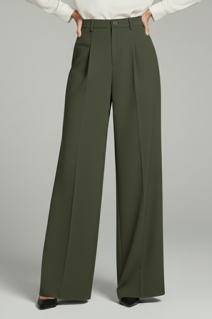 Relaxed fit women's pleated palazzo trousers with deep pockets, combining comfort with contemporary fashion.