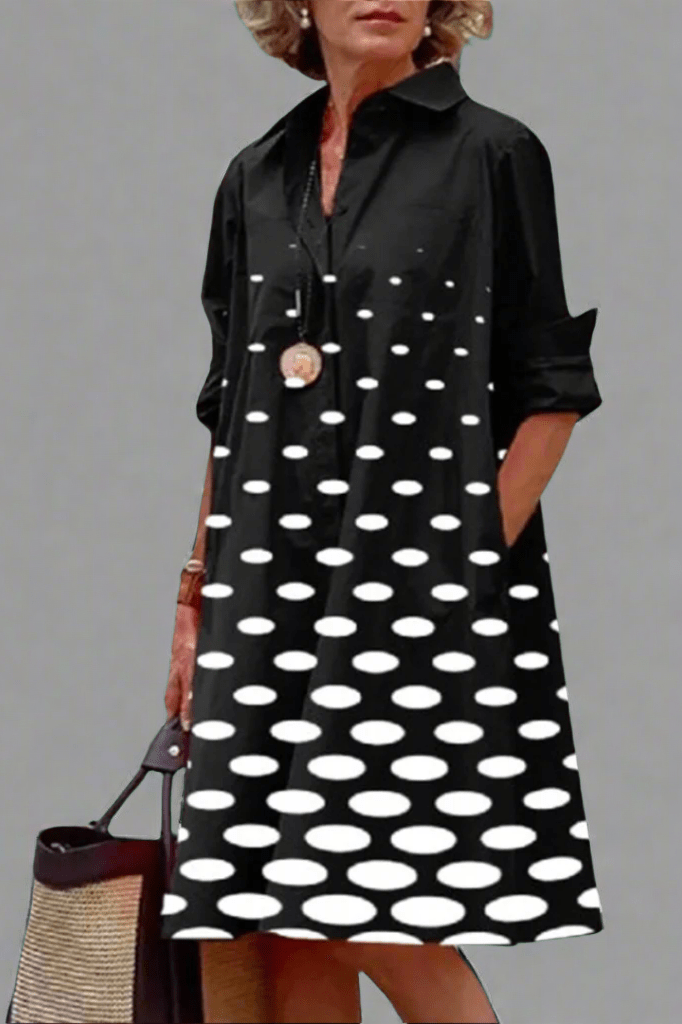 Women's elegant black polka dot button-up A-line midi shirt dress. Classic & sophisticated for smart casual wear.
