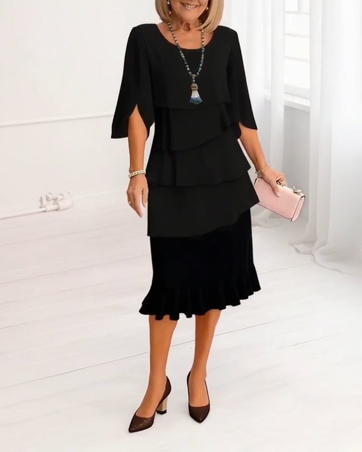 Blue women's tiered midi dress featuring flowing ruffles & trendy split sleeves, ideal for spring casual wear.