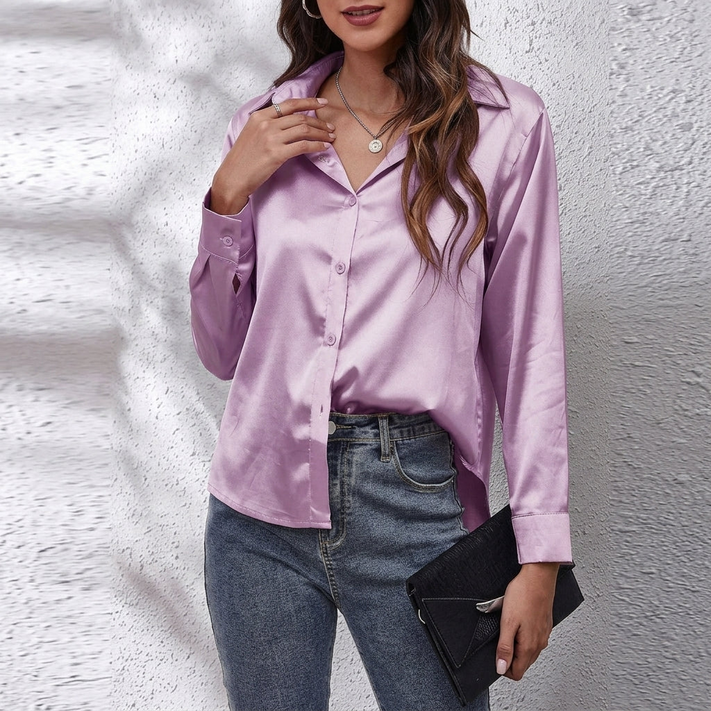 Versatile women's button-front blouse, relaxed fit, long sleeve. Ideal for professional or casual wear.