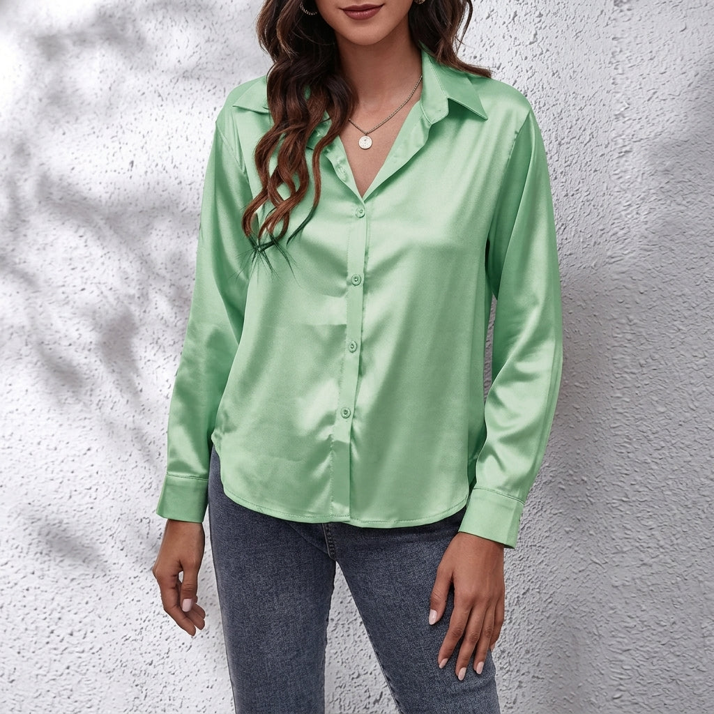 Comfortable women's button-front shirt, long sleeve & relaxed fit, delivering chic and effortless style.