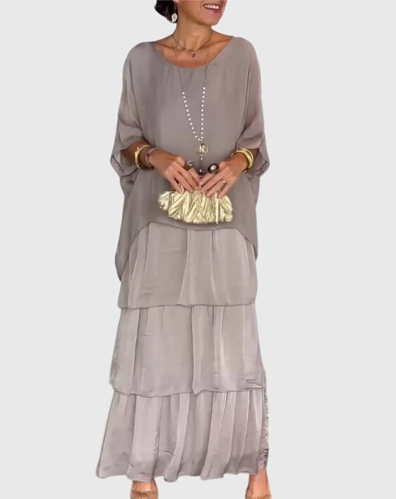 Maxi length formal dress with buttons, ideal for elegant spring events.
