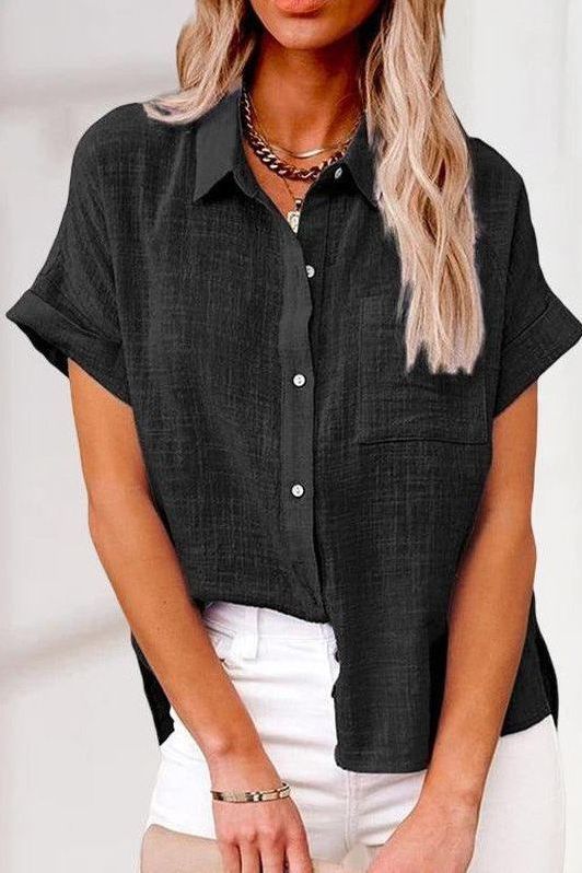 Tailored women's buttoned shirt, ideal for professional workwear and chic office fashion. Classic blouse.