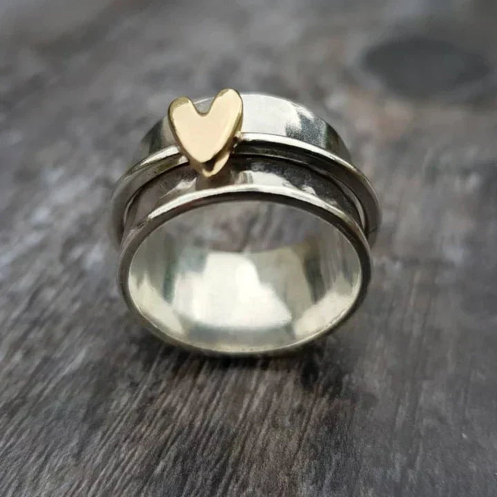 Women's elegant classic silver heart dangle ring. Fashion jewelry perfect for everyday wear.