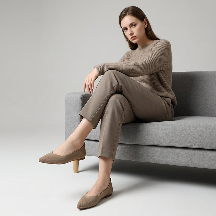 Stylish women's slip-on ballerina flats with a classic round toe, ideal for spring fashion.