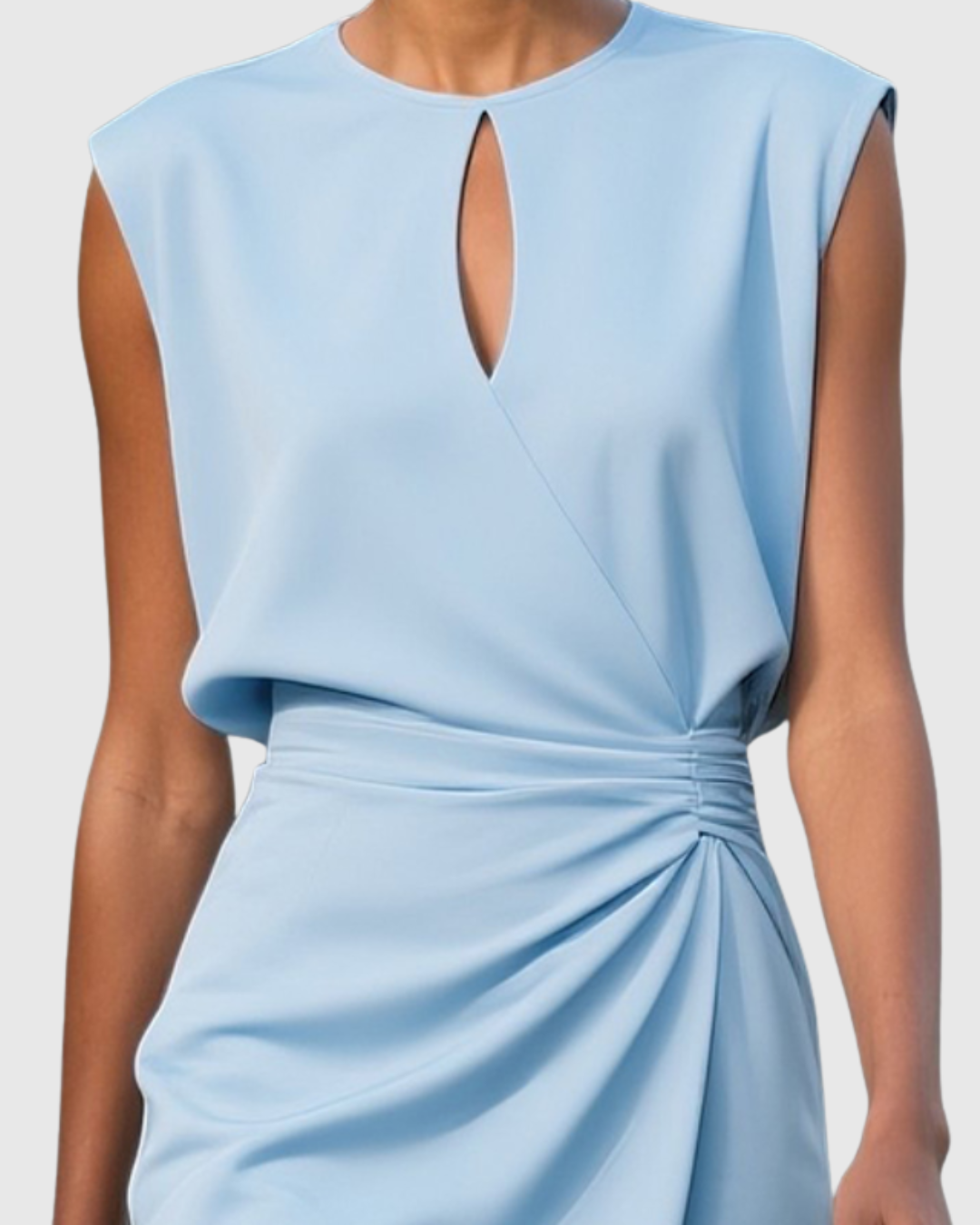 Chic sleeveless knee-length dress for spring/summer. Elegant, comfortable everyday fashion with a flattering fit.