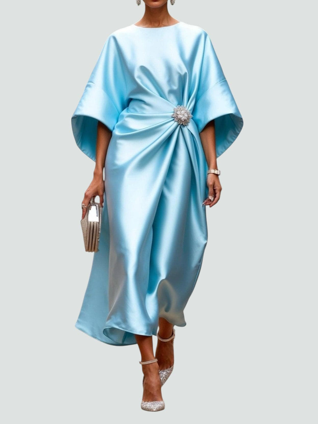 Comfortable women's flowy midi dress with elegant drape and stylish batwing sleeves.