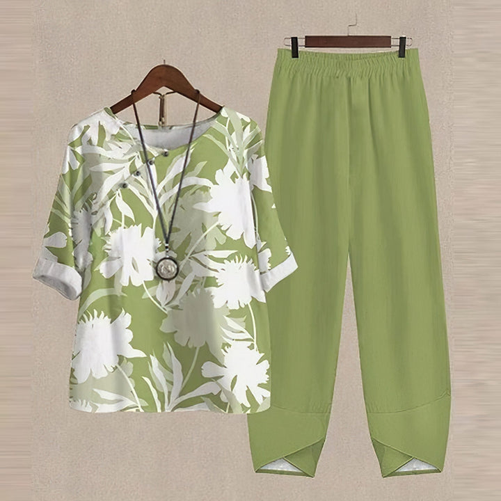 Casual floral two-piece set for women, featuring a breezy top & loose harem pants, great for vacation.