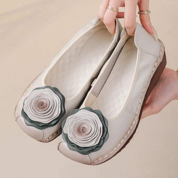 Women's elegant floral appliqué slip-on loafers for comfortable everyday wear.