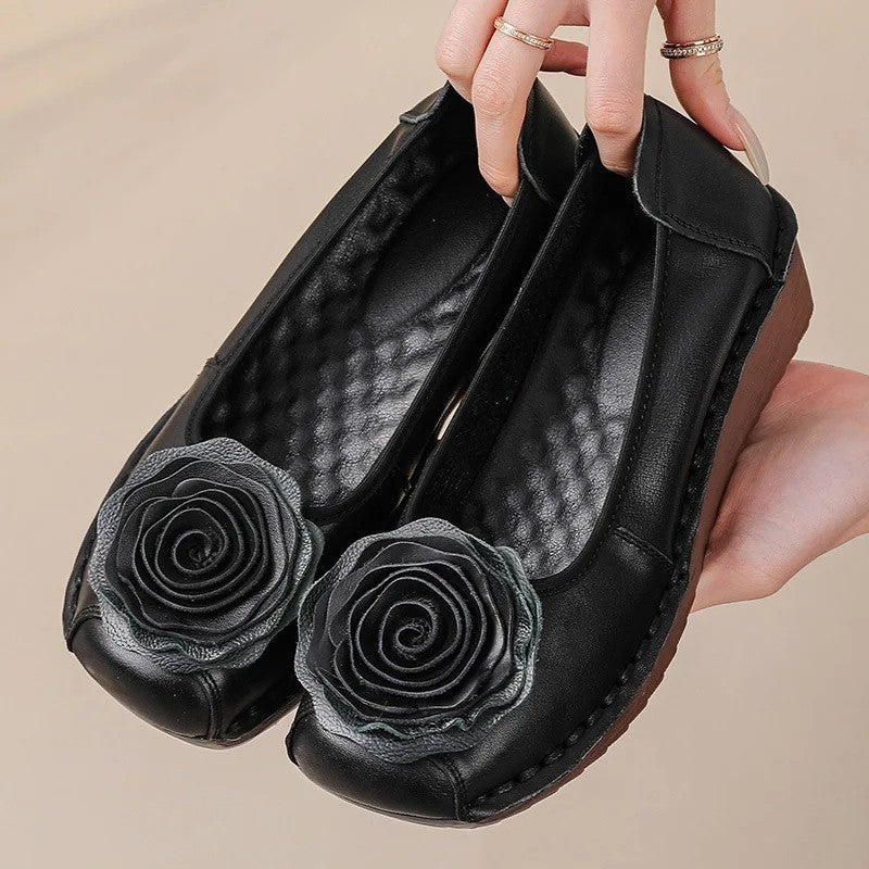 Chic women's comfort loafers with delicate floral appliqué, perfect for spring.