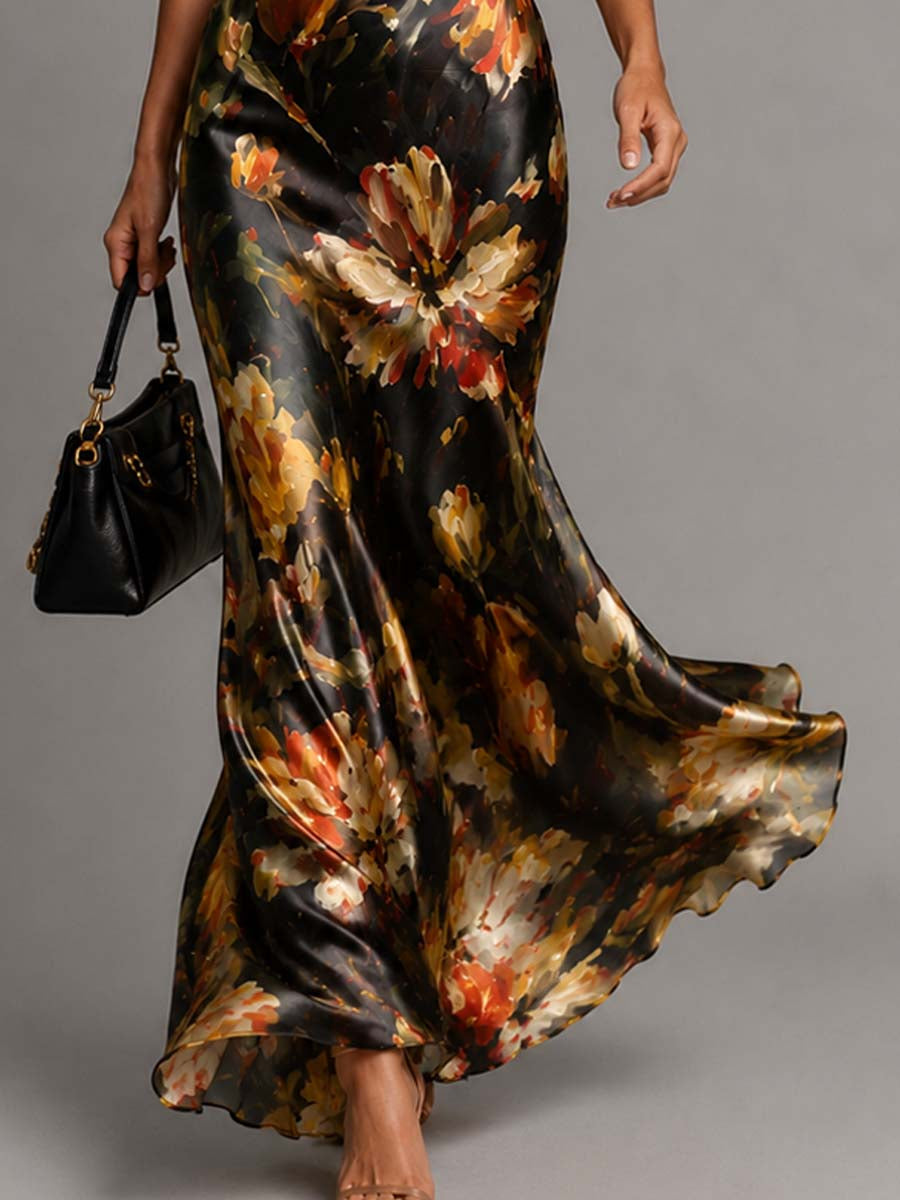 Stylish women's bias-cut floral maxi dress featuring a cowl neck and spaghetti straps, perfect for formal events.