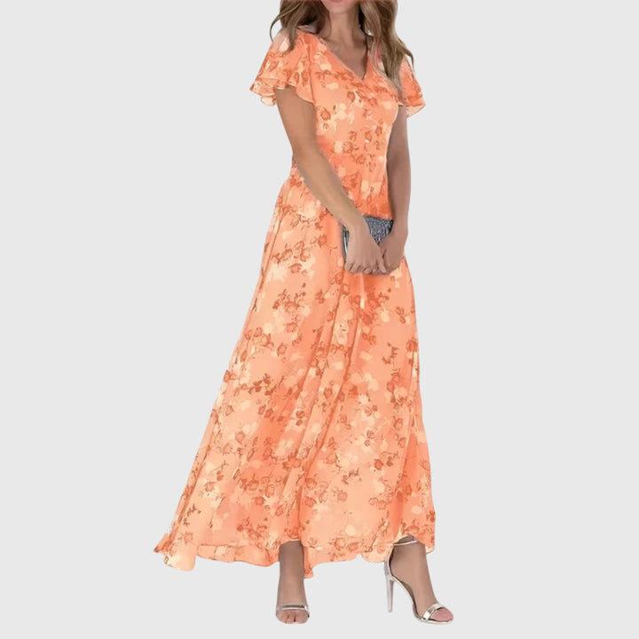 Women's elegant floral maxi dress with V-neck and flutter sleeves, perfect for spring and summer vacation.
