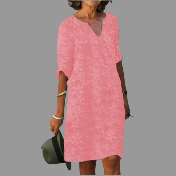 Chic women's floral print midi dress, elegant V-neck, half sleeves; suitable for summer, casual, or party wear.