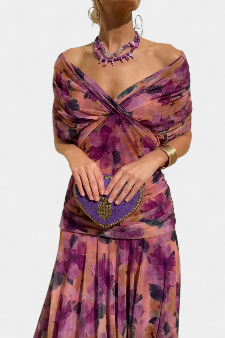Women's floral off-shoulder maxi dress, long sleeves, elegant and flowy for special events.