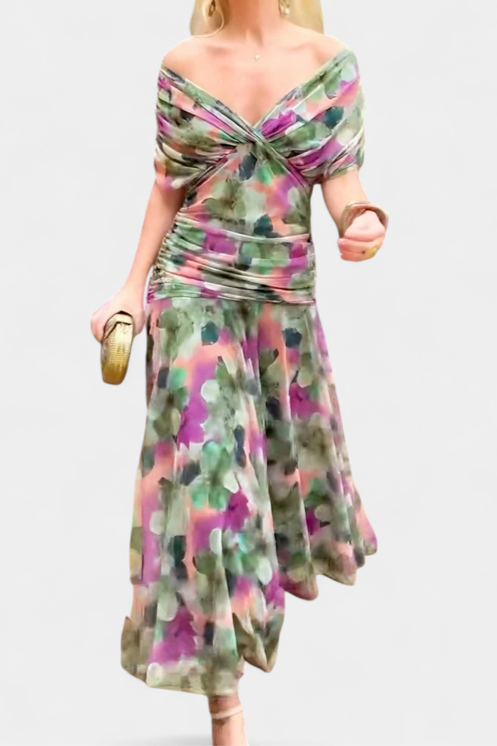 Flowy women's floral off-shoulder maxi dress with long sleeves, perfect for evening events.