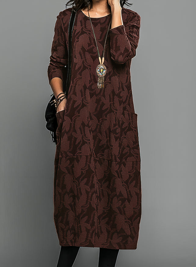 Stylish women's printed midi dress, perfect as a wedding guest or party dress in spring