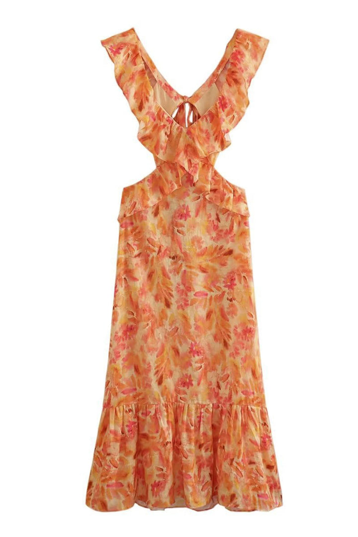 A vibrant bouquet of flowers complementing the floral print of the women's ruffle maxi dress.
