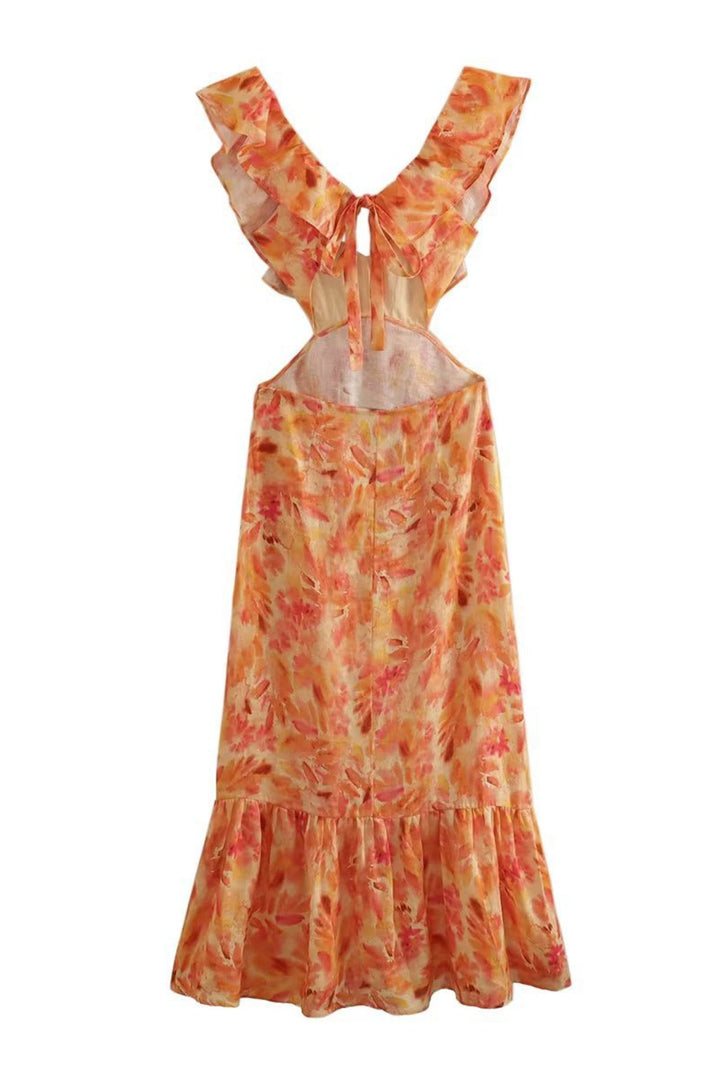 Women's floral maxi dress with a defined waist and flowing skirt, perfect for spring occasions.
