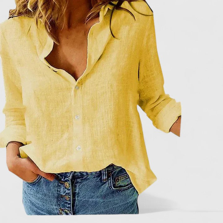 Trendy women's floral V-neck long sleeve blouse, offering a chic look for spring and summer activities.