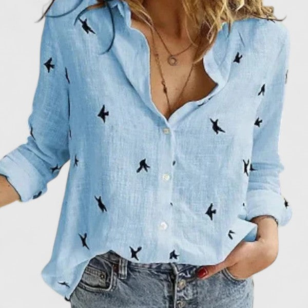 Fashionable women's floral print V-neck long sleeve blouse, designed for elegance and versatility.
