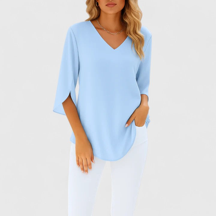 Comfortable women's elegant flowy blouse with a relaxed fit for effortless style. Perfect fashion top.