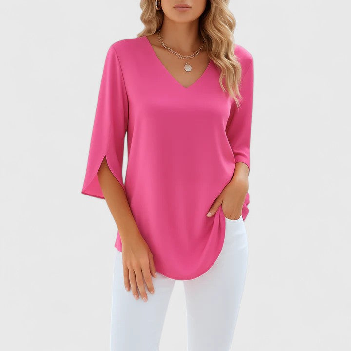 Chic women's flowy blouse, elegant relaxed fit top. Features split sleeves for a versatile office-to-casual style.