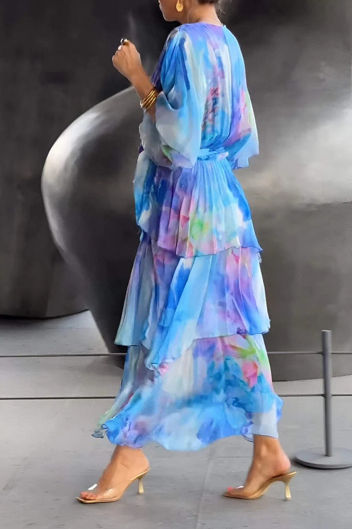 Feminine women's elegant watercolor maxi dress with a beautiful flowy silhouette, perfect for evening wear.