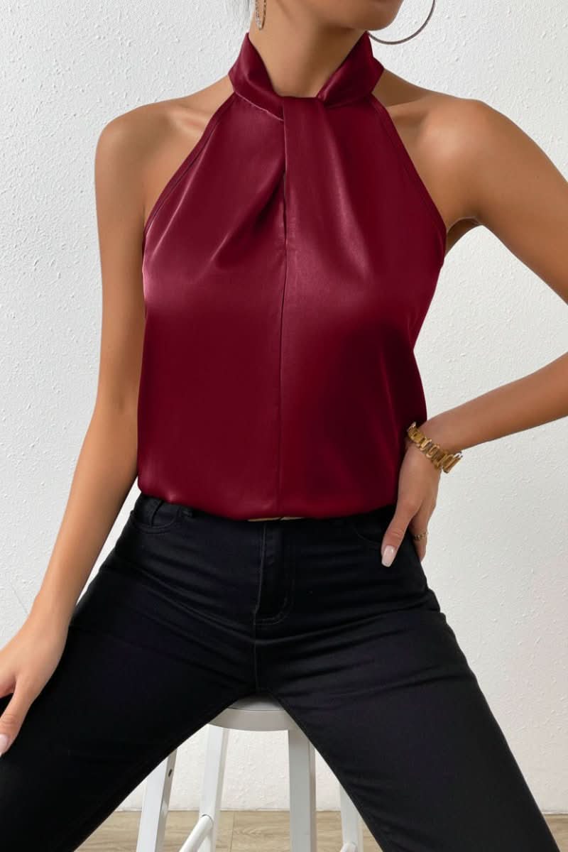 Sophisticated women's elegant halter blouse with a knot accent, a chic sleeveless top perfect for modern workwear.