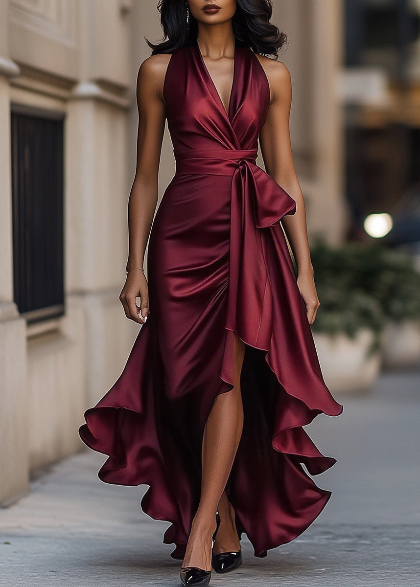 Sophisticated women's evening gown with halter neck, flowing asymmetric ruffle & luxurious fabric.