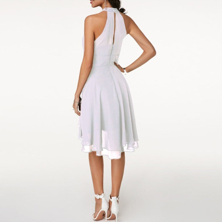 Sleeveless women's halter neck mini dress, ideal for cocktail parties and formal occasions. Stylish.