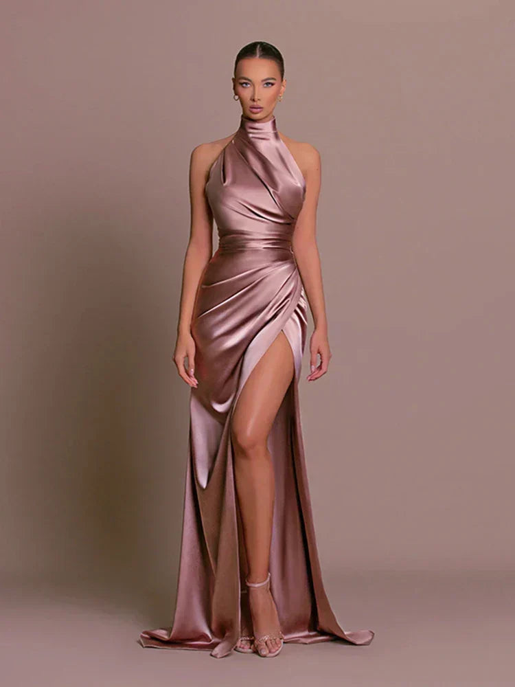 Women's elegant halter neck ruched bodycon maxi dress with a high split, perfect for formal events & parties.