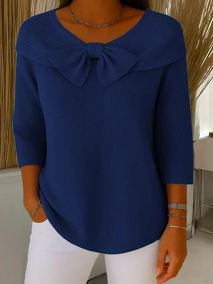 Elegant women's long sleeve sweater featuring a stylish bow, ideal for smart casual or chic outfits.