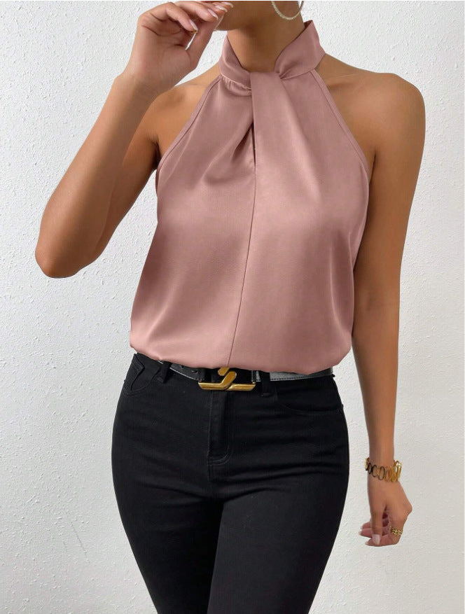 Sophisticated women's top, sleeveless, with a unique knot neck halter detail.