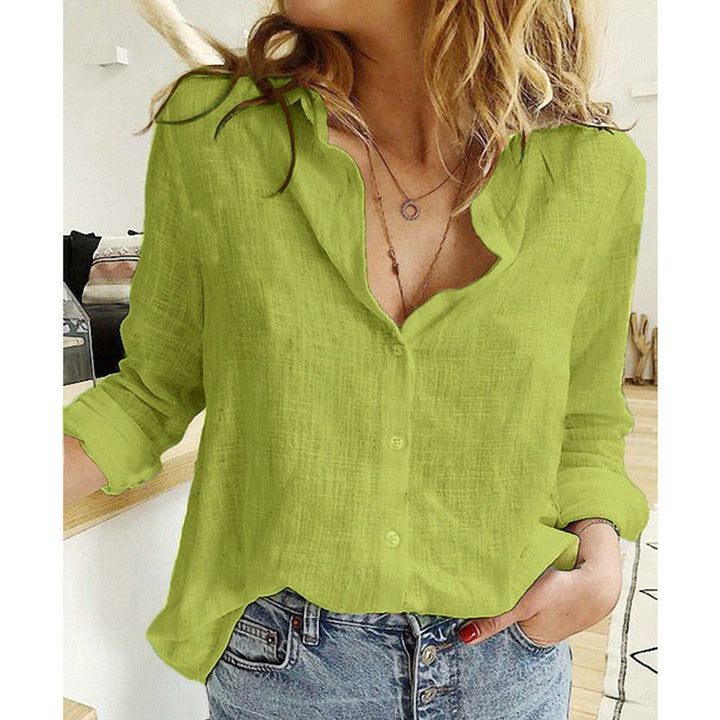 Classic solid color women's blouse, long-sleeve for comfortable and elegant everyday fashion.