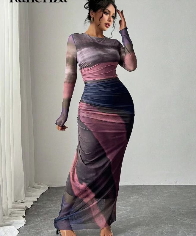 Flattering ruched long sleeve bodycon maxi dress, elegant women's fashion for special nights.