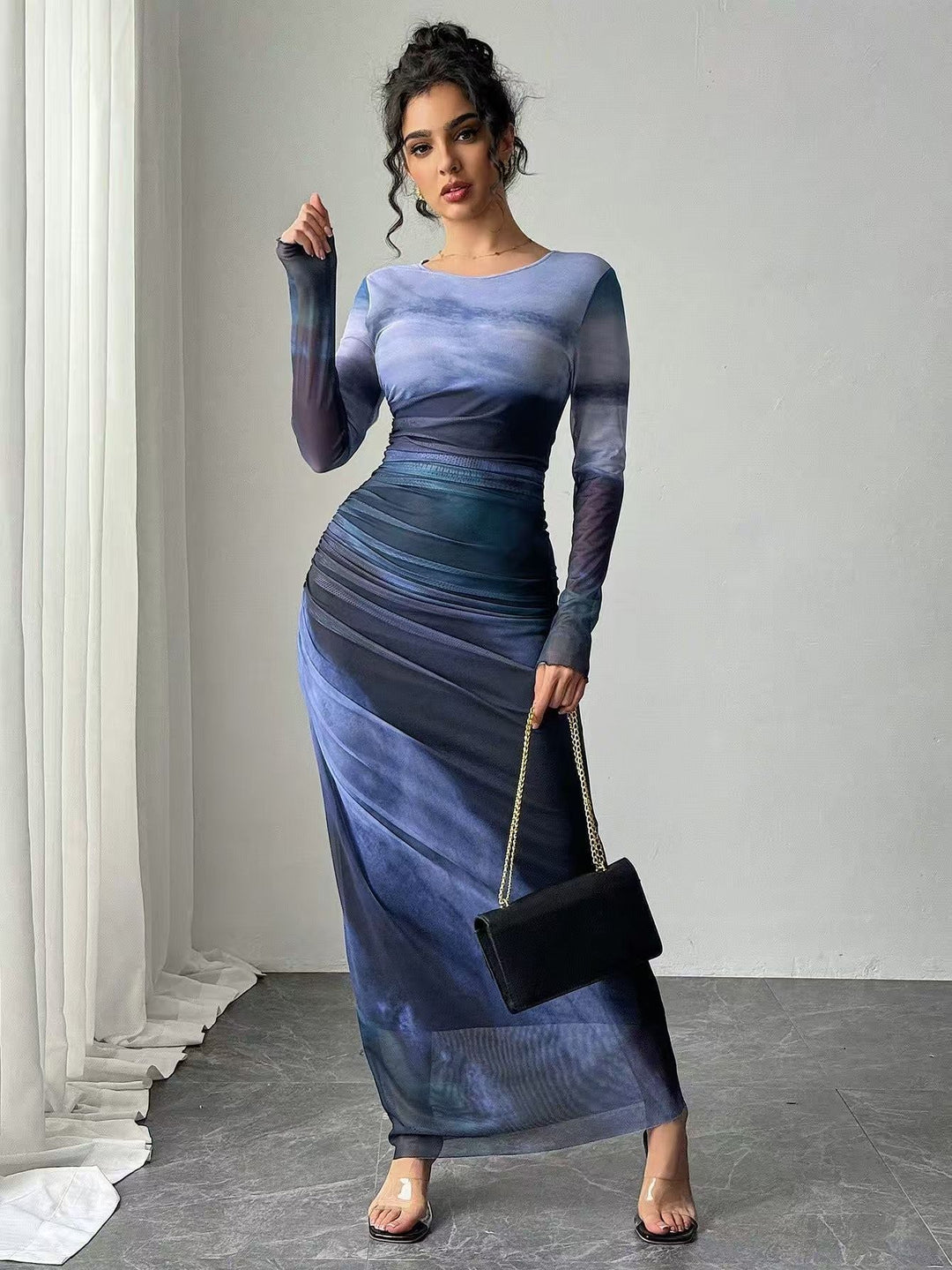 Classic women's long sleeve bodycon maxi dress, perfect for sophisticated party wear.