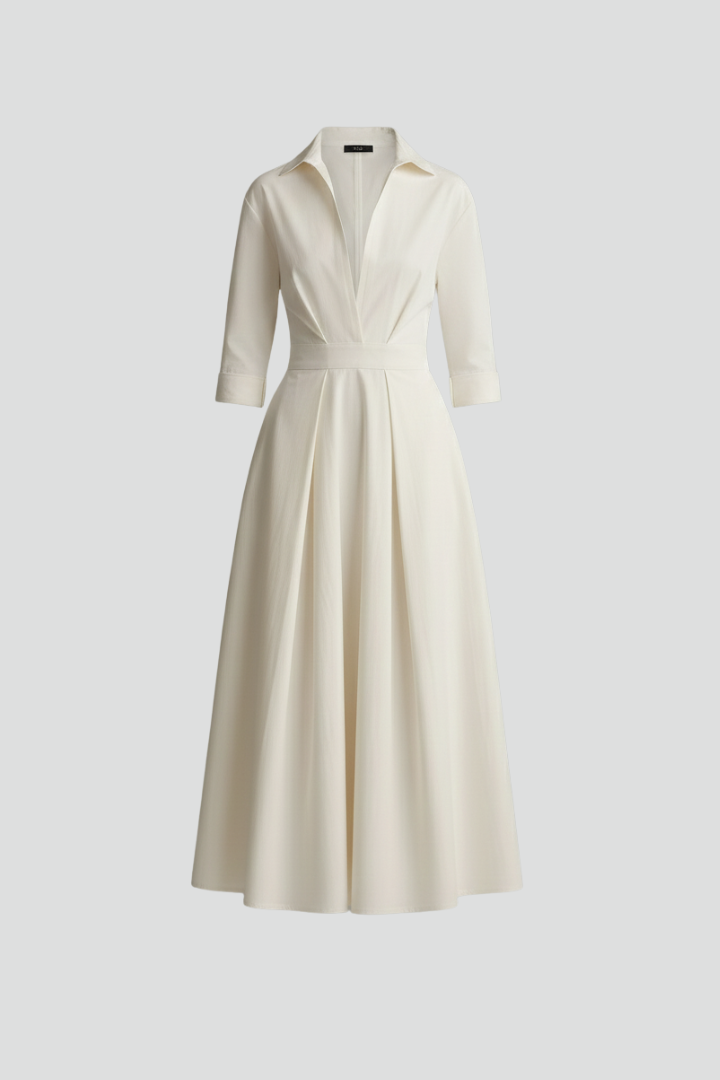 Women's elegant long sleeve midi dress with defined waist, button front, and flared skirt. Perfect day dress.