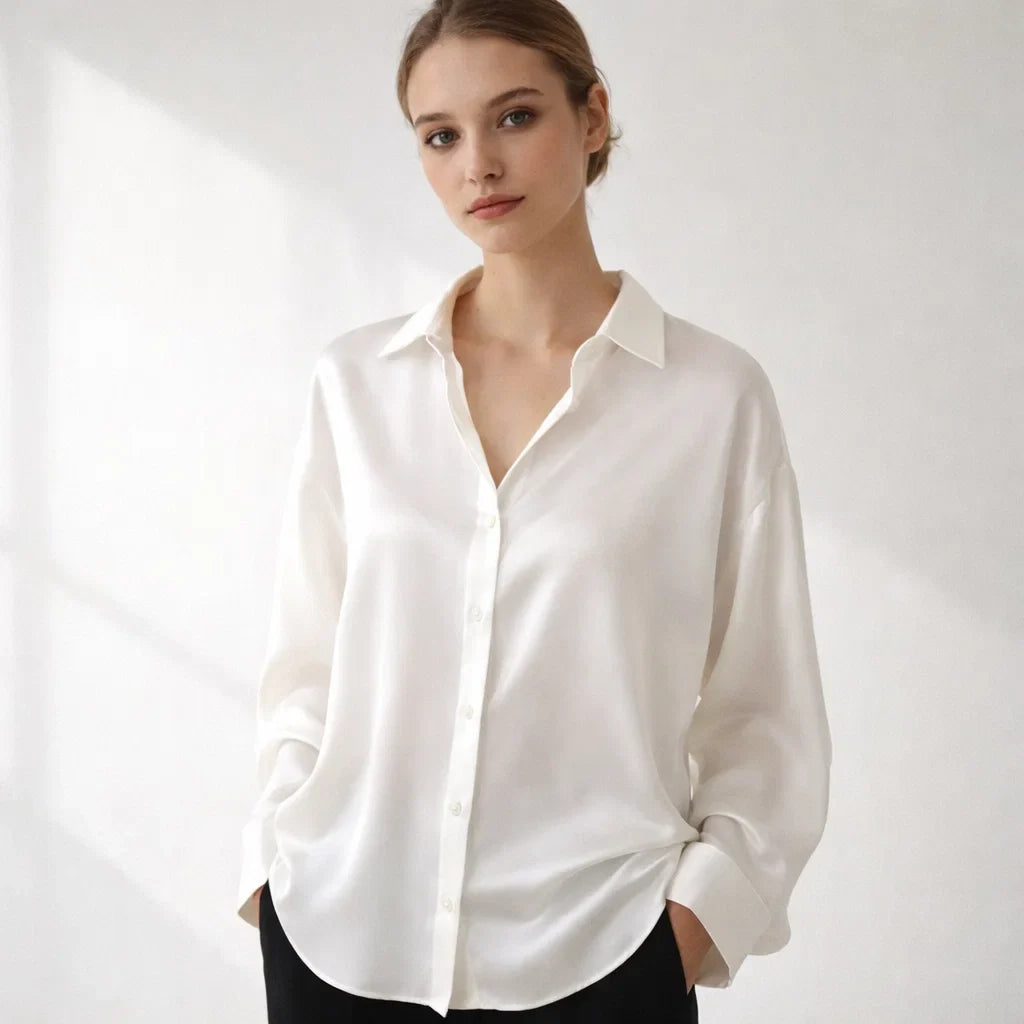 Chic women's long sleeve blouse, an elegant top ideal for versatile office wear.