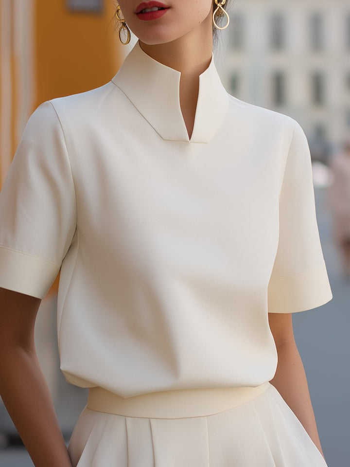 Versatile women's short sleeve mandarin collar blouse, relaxed fit, perfect for office or dinner.