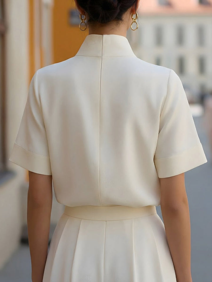 Elegant women's stand collar short sleeve blouse, relaxed fit, ideal for work or casual settings.