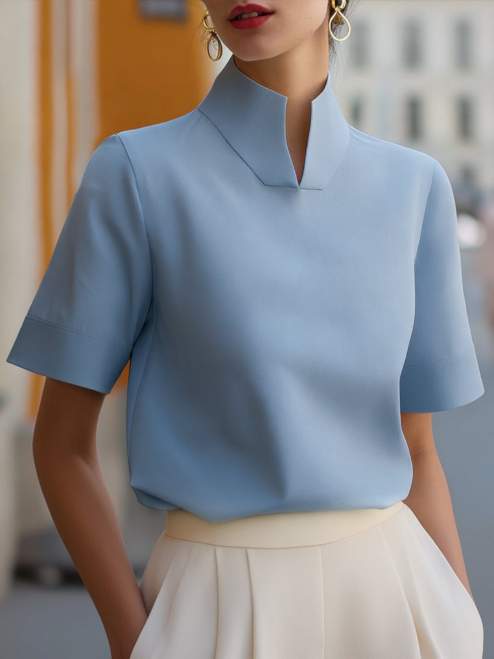 Chic women's mandarin collar blouse, short sleeve, relaxed fit, elegant for work and casual outings.
