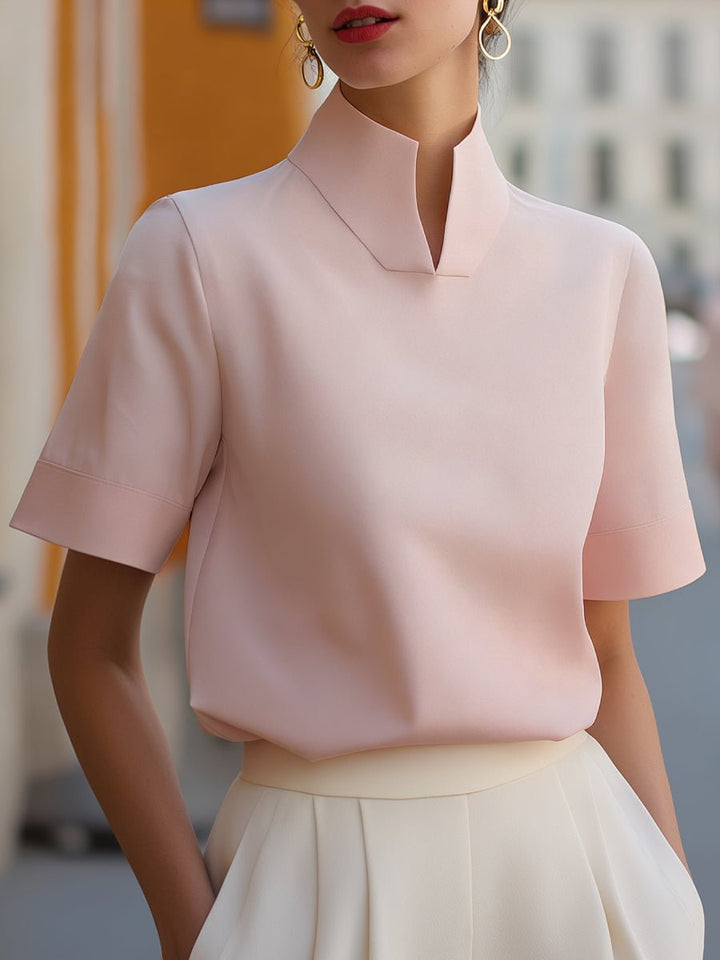 Women's elegant mandarin collar short sleeve blouse, relaxed fit, ideal for modern sophisticated style.