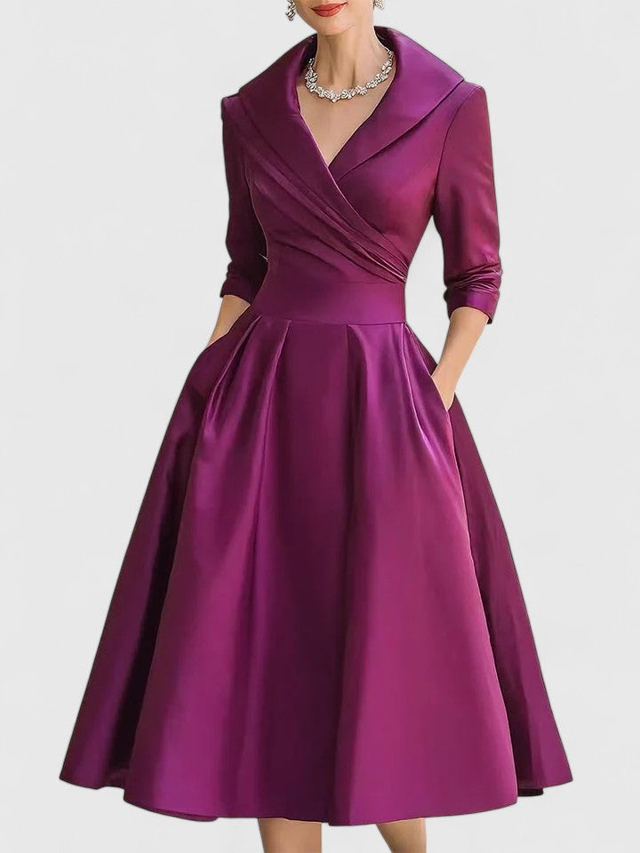 Women's elegant midi dress with convenient pockets, a stylish and practical choice for any occasion.