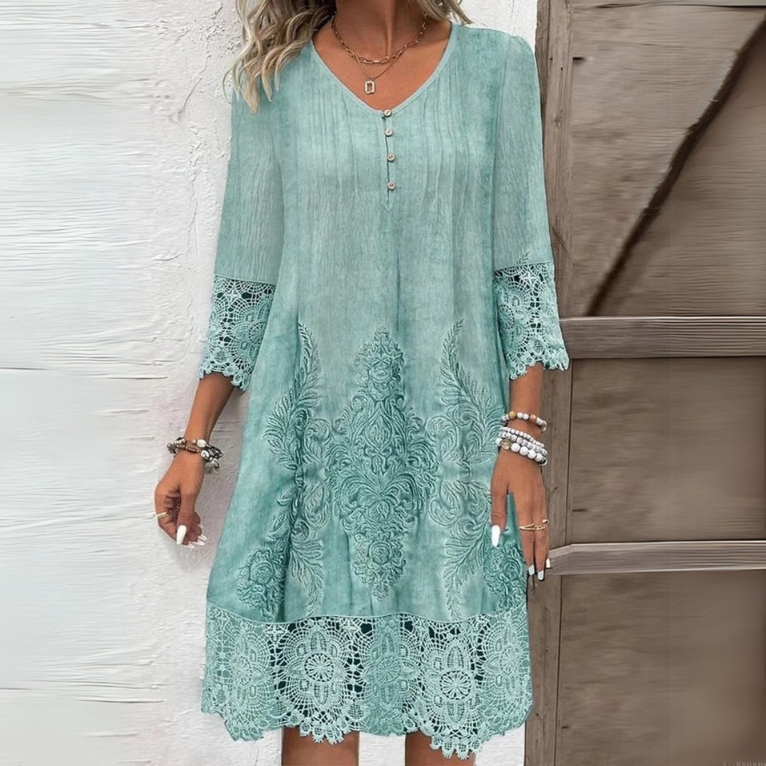 Versatile women's shift midi dress featuring elegant lace and three-quarter sleeves for comfortable everyday wear.
