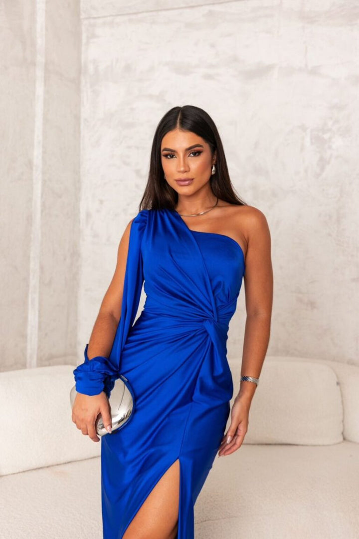 Women's royal blue draped long dress, one-shoulder design, perfect for sophisticated evening wear.