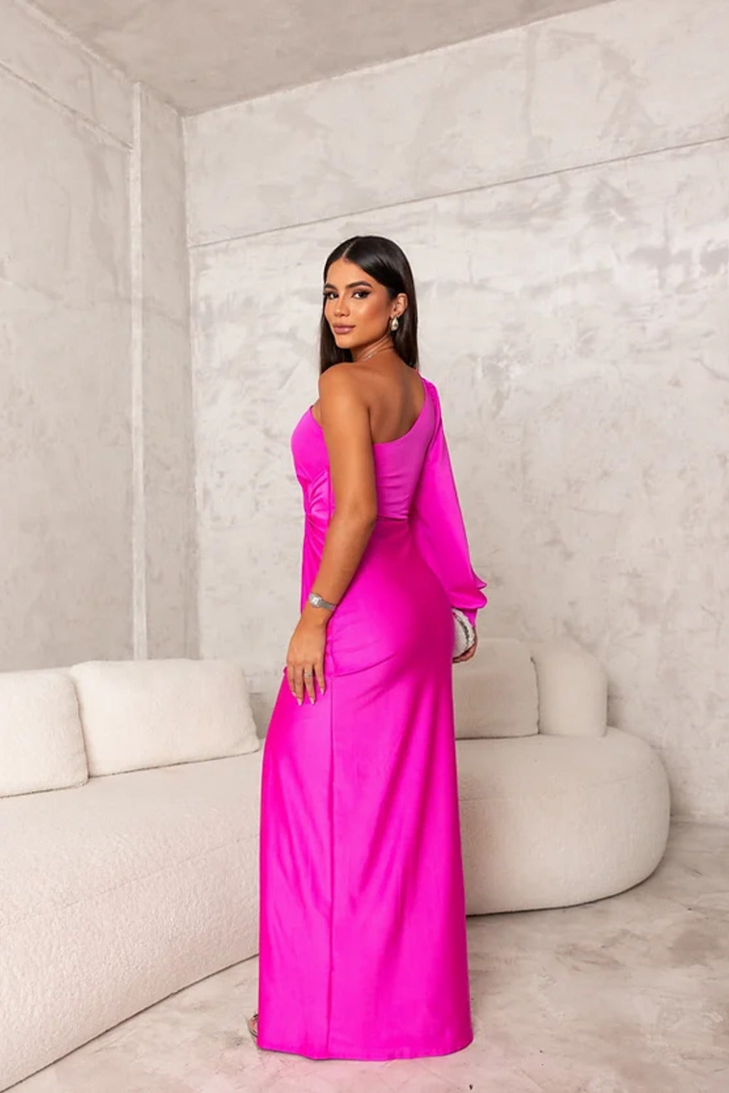 Soft blush pink one-shoulder wedding guest dress, elegant and feminine formal wear.