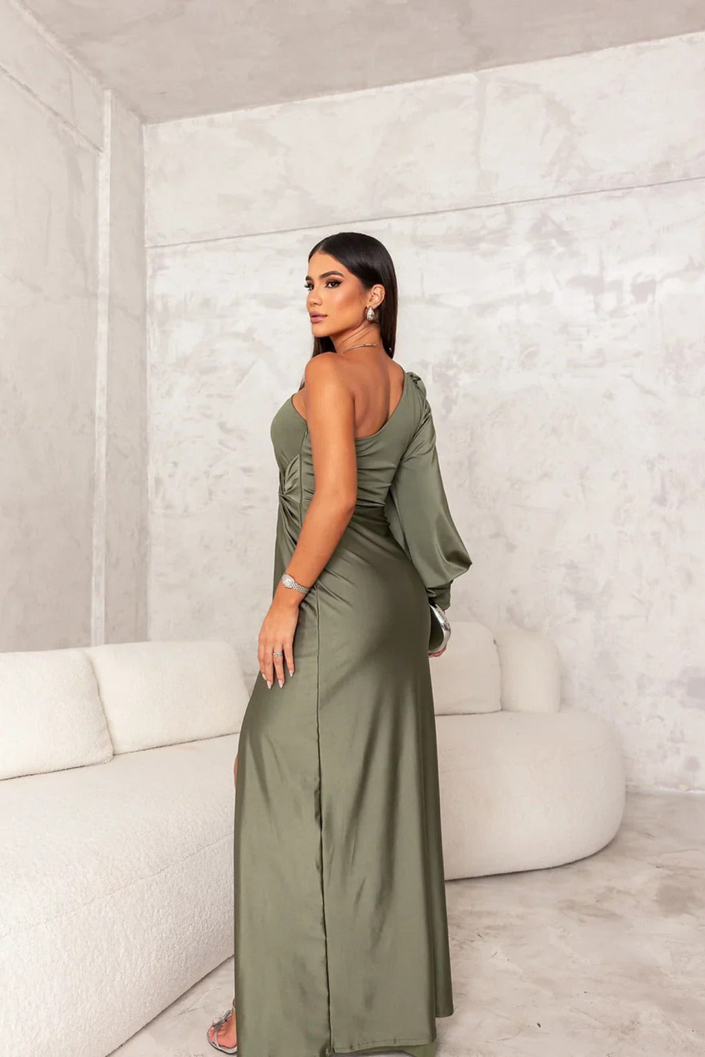 Formal navy blue evening gown with one-shoulder design, ideal for sophisticated wedding guest attire.